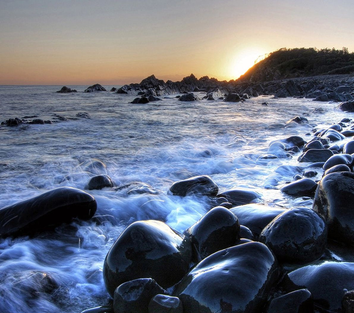 Coastal Erosion: Wave-Washed Rocks Wall Mural