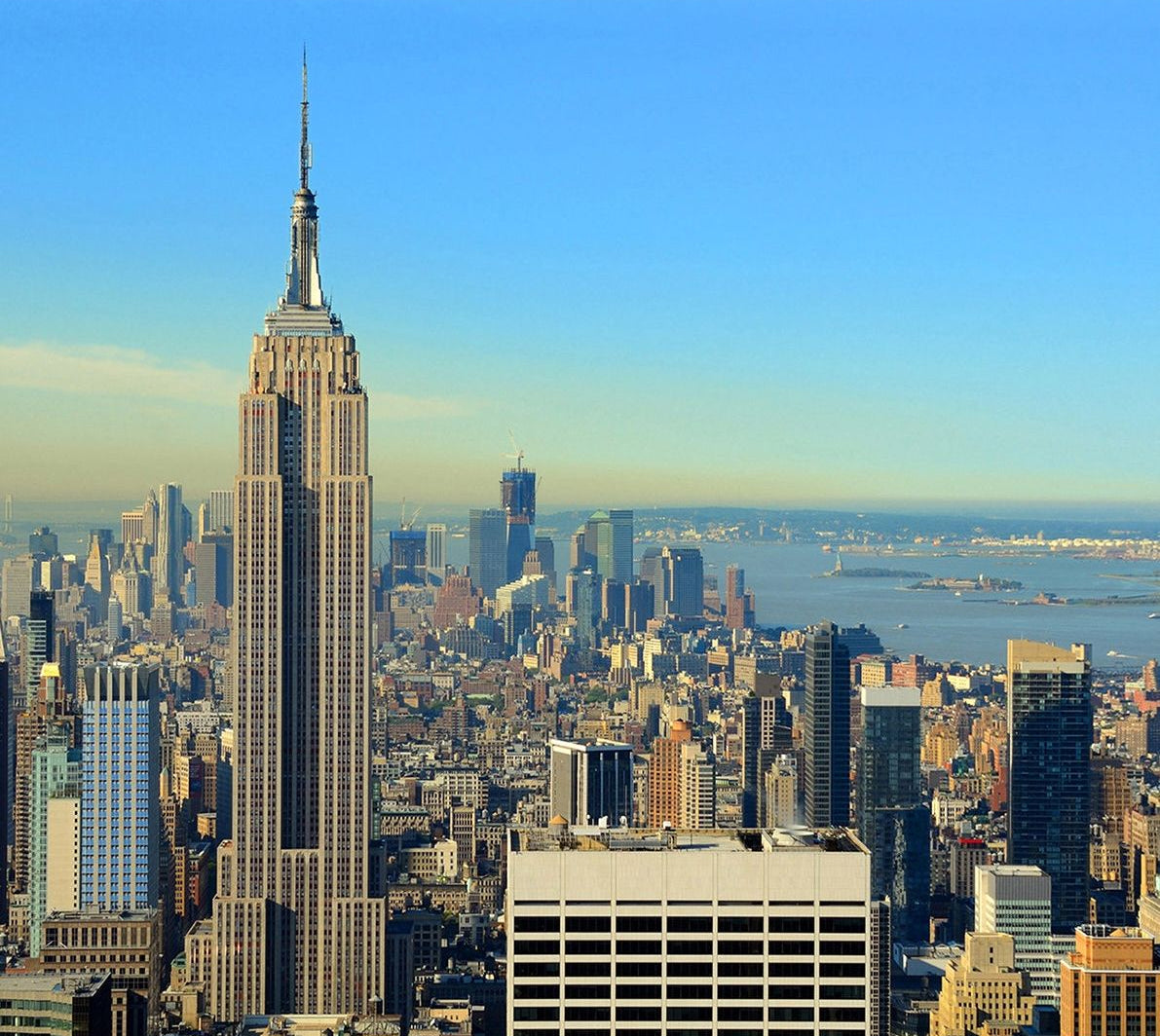 City Skyline Serenity: Clear Sky Wall Mural