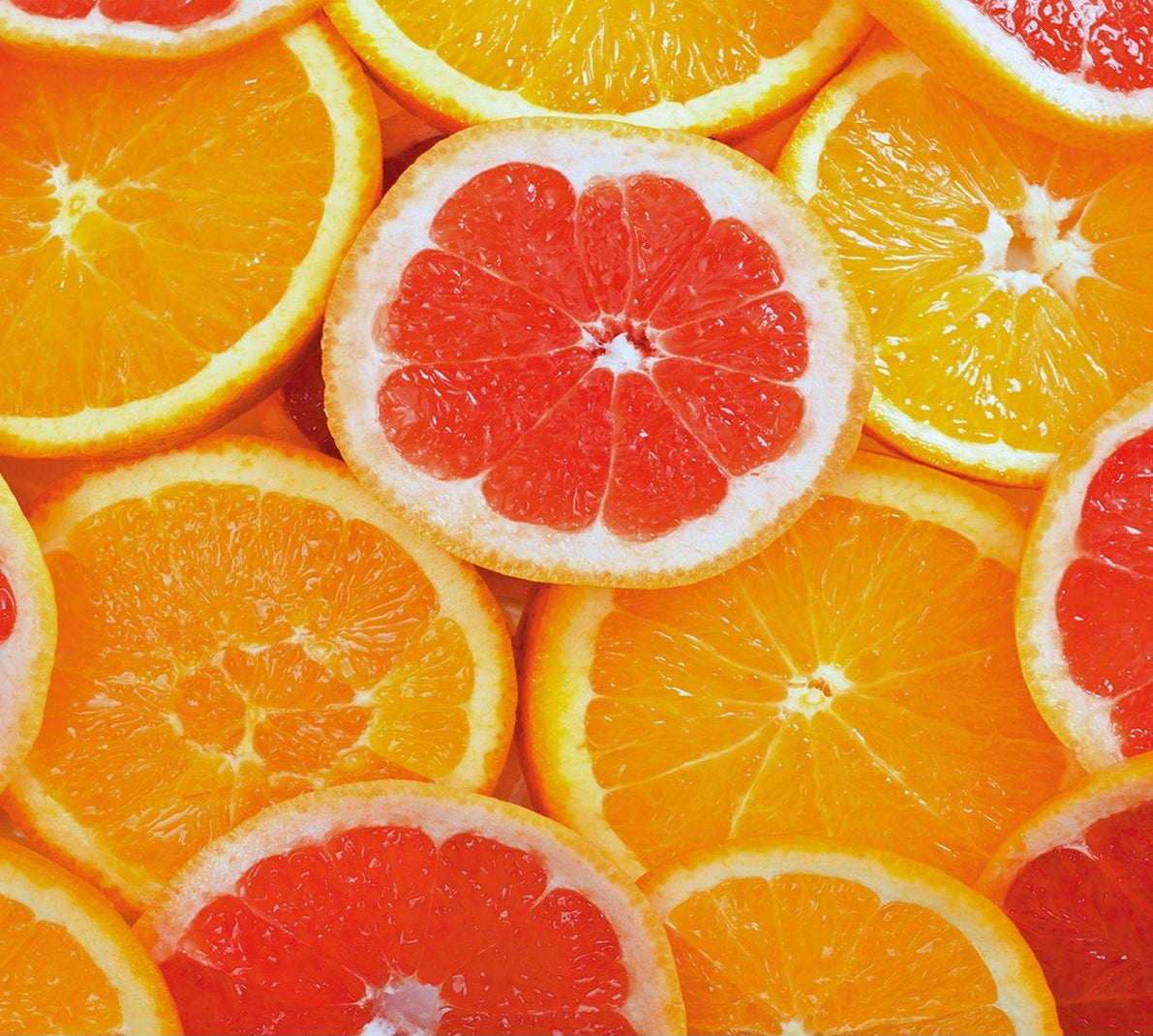Citrus Delight: Sliced Oranges Wall Mural