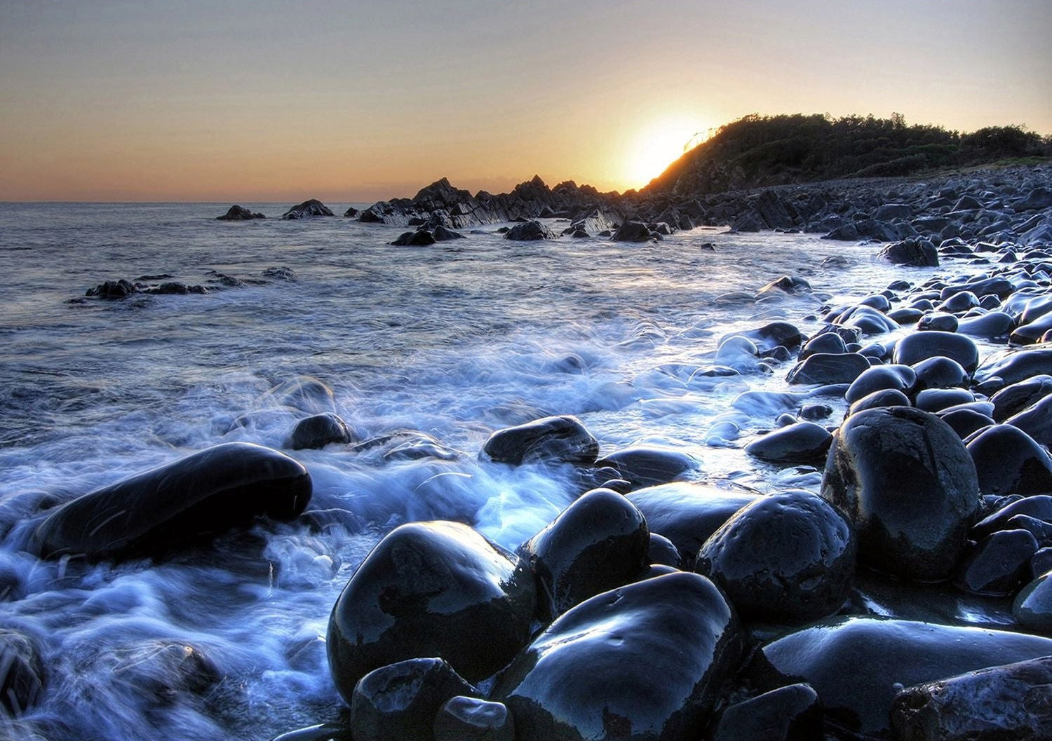 Coastal Erosion: Wave-Washed Rocks Wall Mural