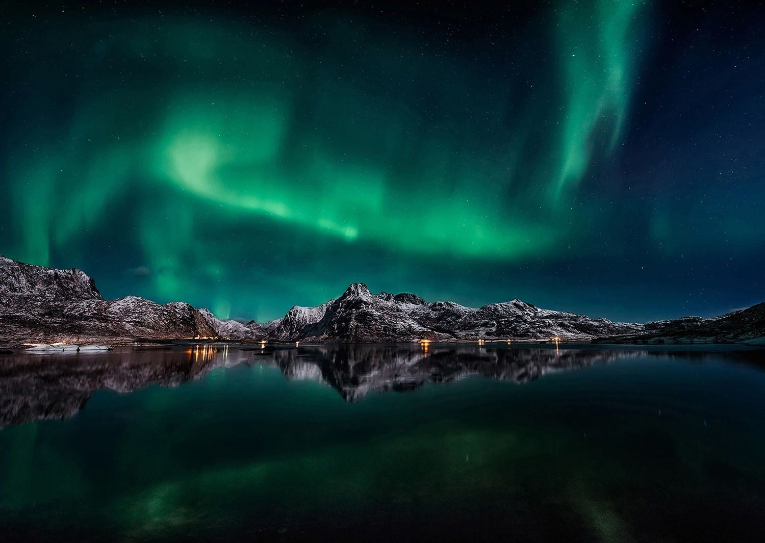 Northern Lights Serenity: Aurora Illuminating Dark Rocks & Water Wall Mural