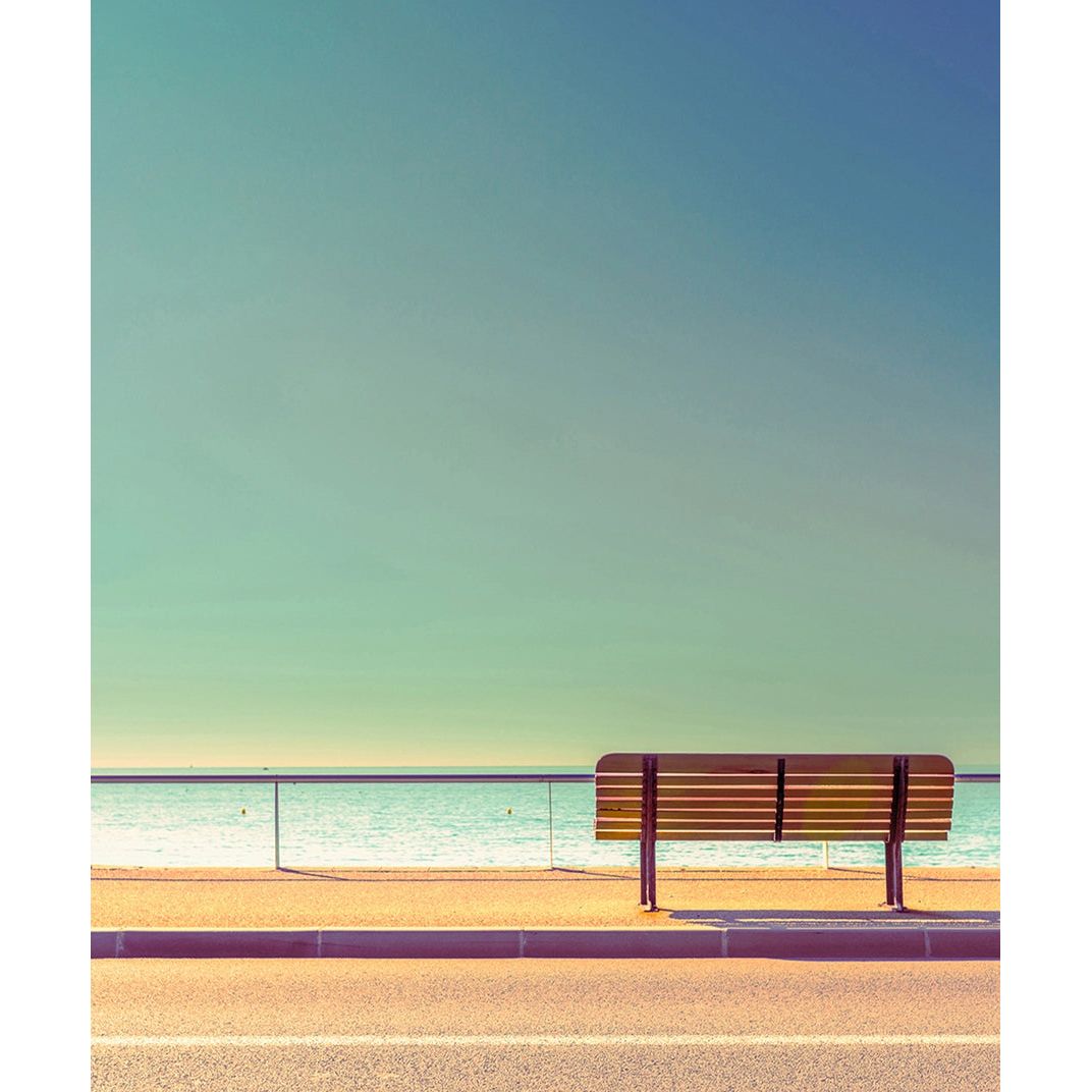 Seaside Serenity: Bench by the Calm Sea Wall Mural