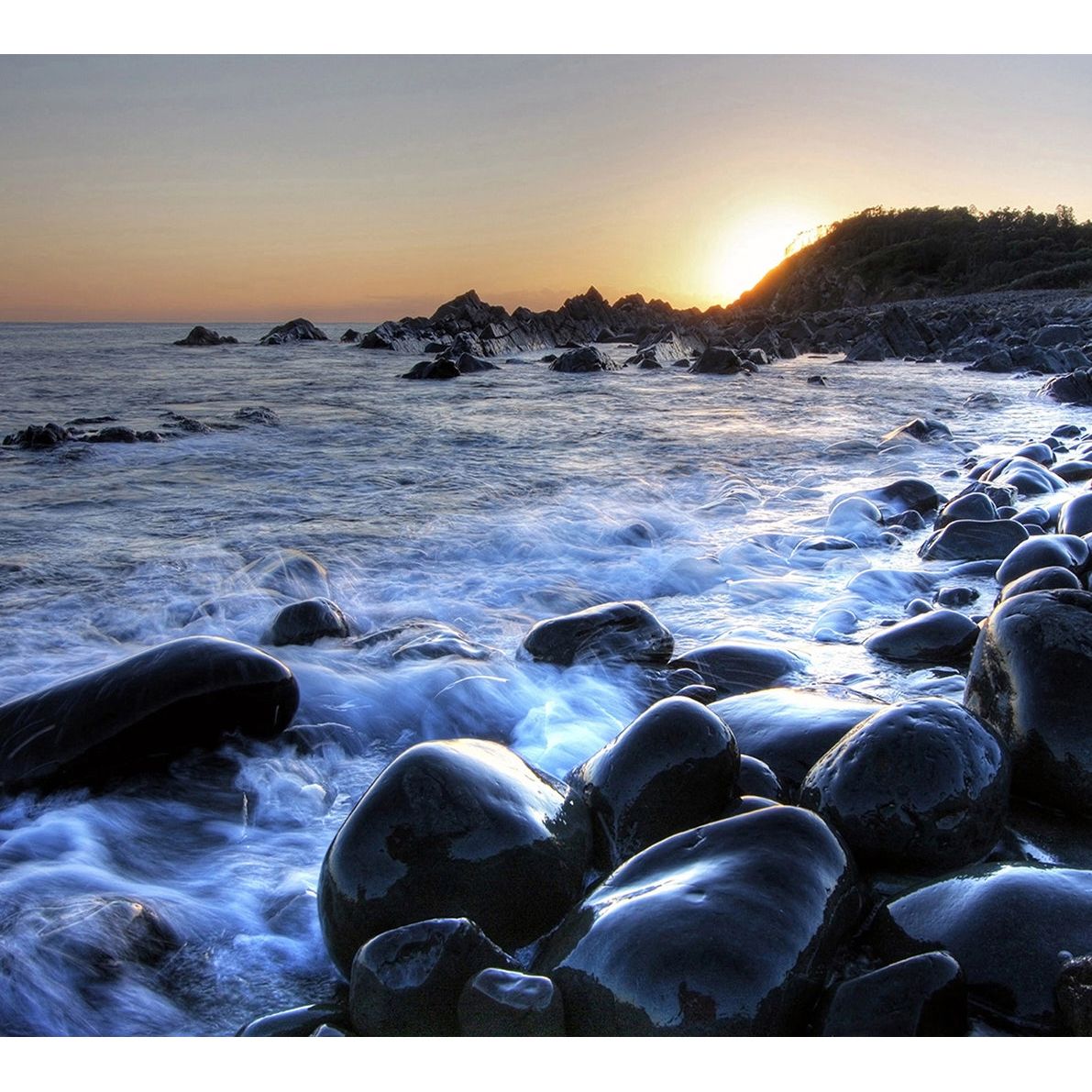 Coastal Erosion: Wave-Washed Rocks Wall Mural